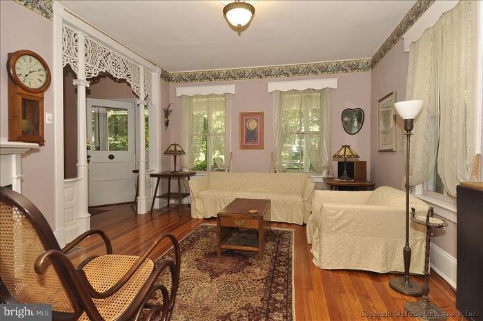 1910 Grace Church Road Silver Spring, MD 20910 - Photo 3 of 16 a living room with furniture and wooden floor