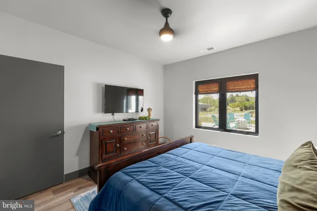 a kitchen with counter space appliances and a large window