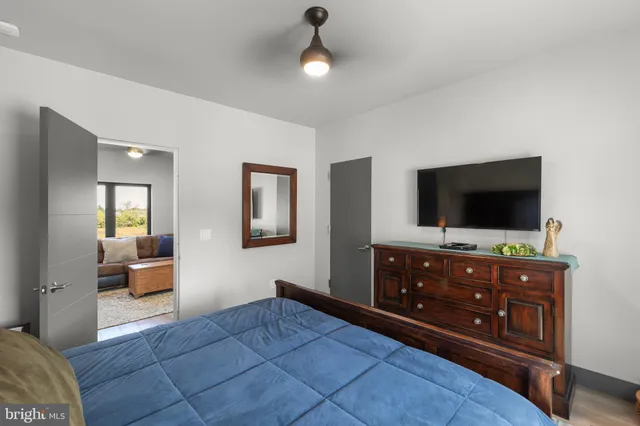 a view of a room with a large window