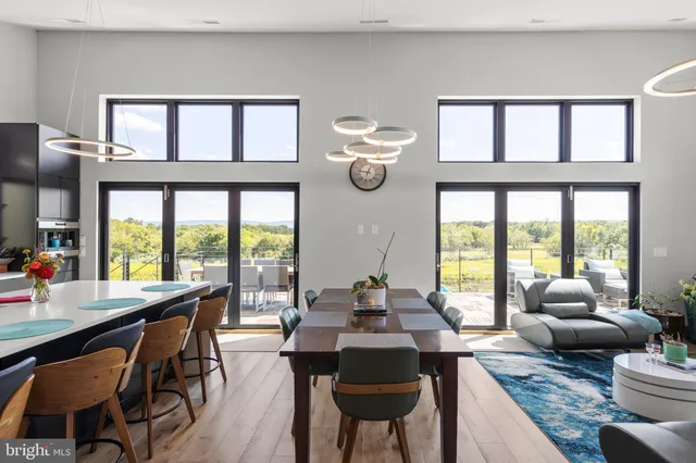 a view of ocean from balcony with seating space