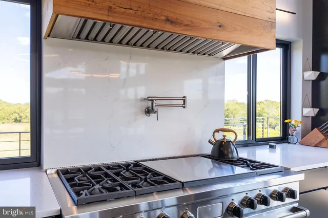 a house view with a seating space and garden view