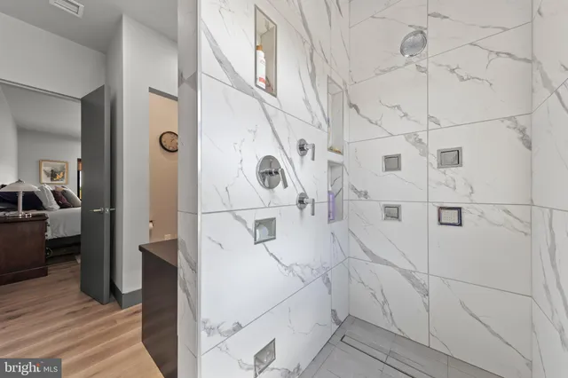 a aerial view of a house with garden space and outdoor seating