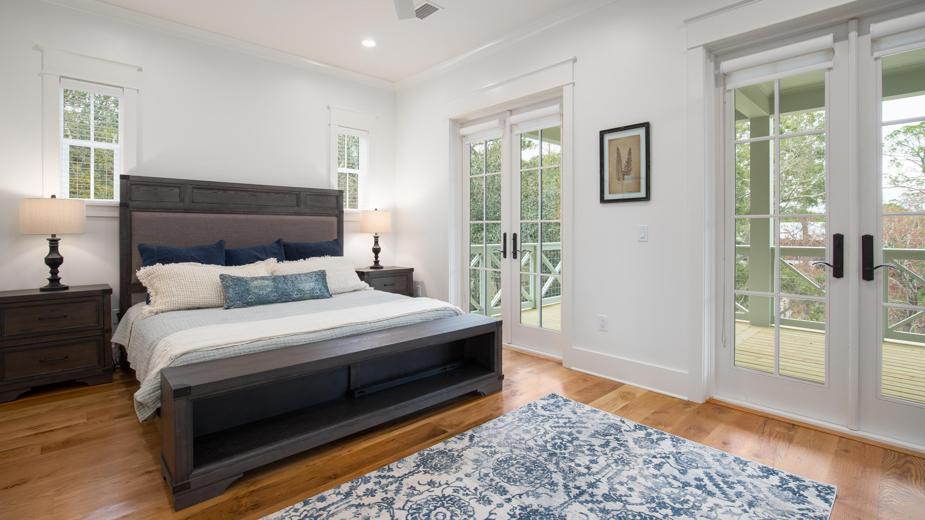 177 Grayton Trail Road Santa Rosa Beach, FL 32459 - Photo 20 of 78 a bedroom with a bed and glass door