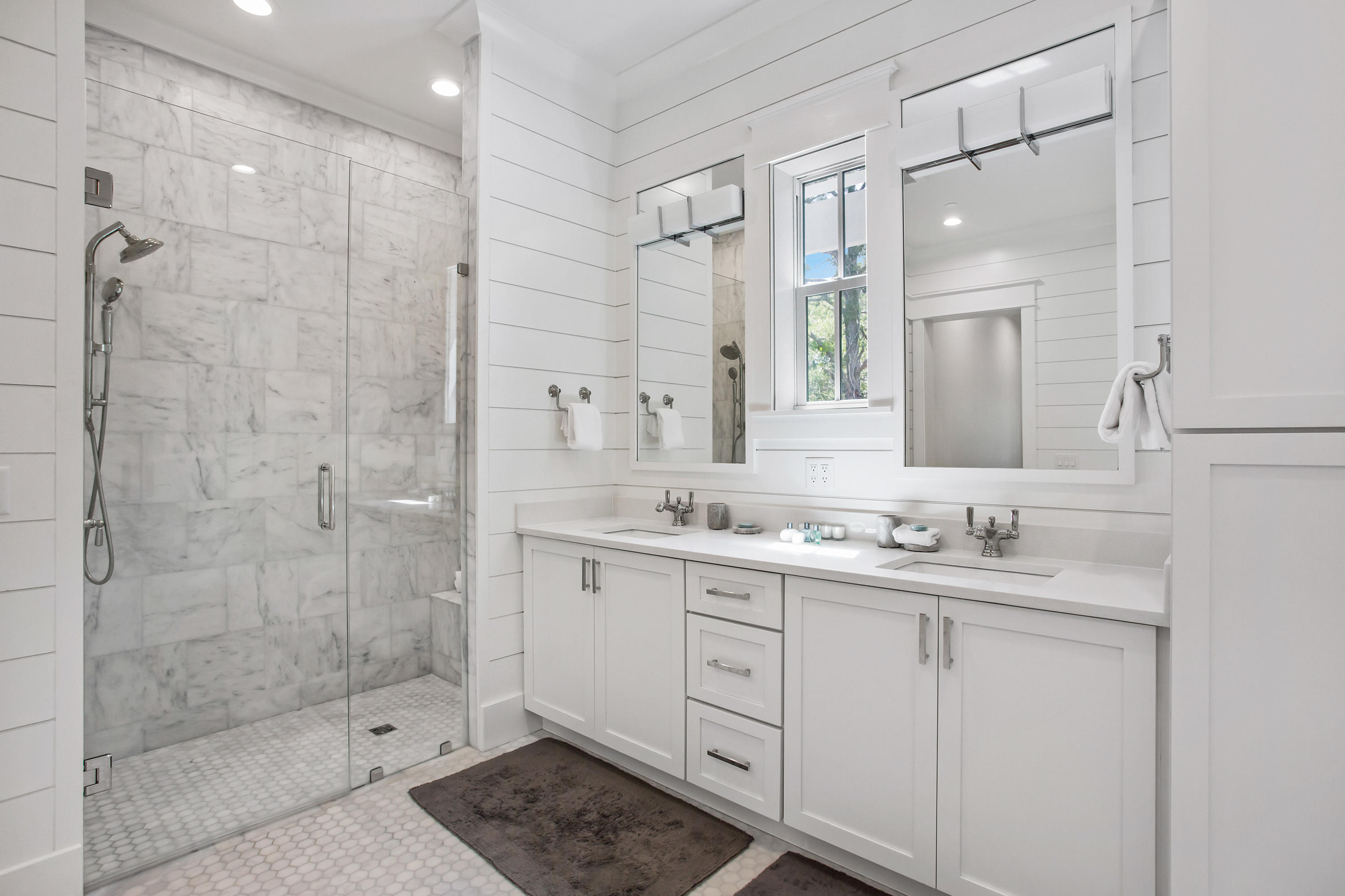 177 Grayton Trail Road Santa Rosa Beach, FL 32459 - Photo 26 of 78 a bathroom with a double vanity sink mirror and shower