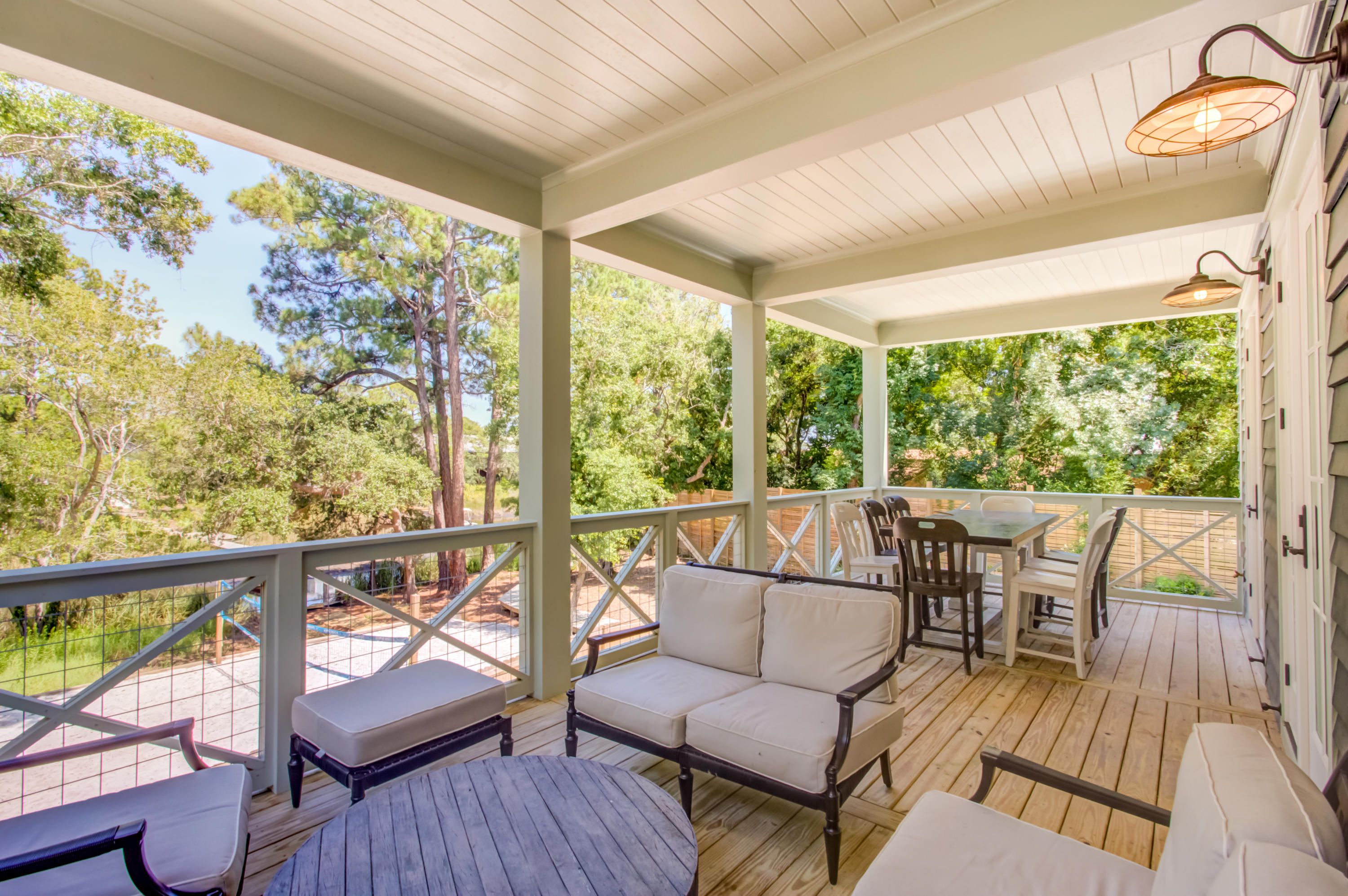 177 Grayton Trail Road Santa Rosa Beach, FL 32459 - Photo 38 of 78 a balcony with wooden floor and outdoor seating