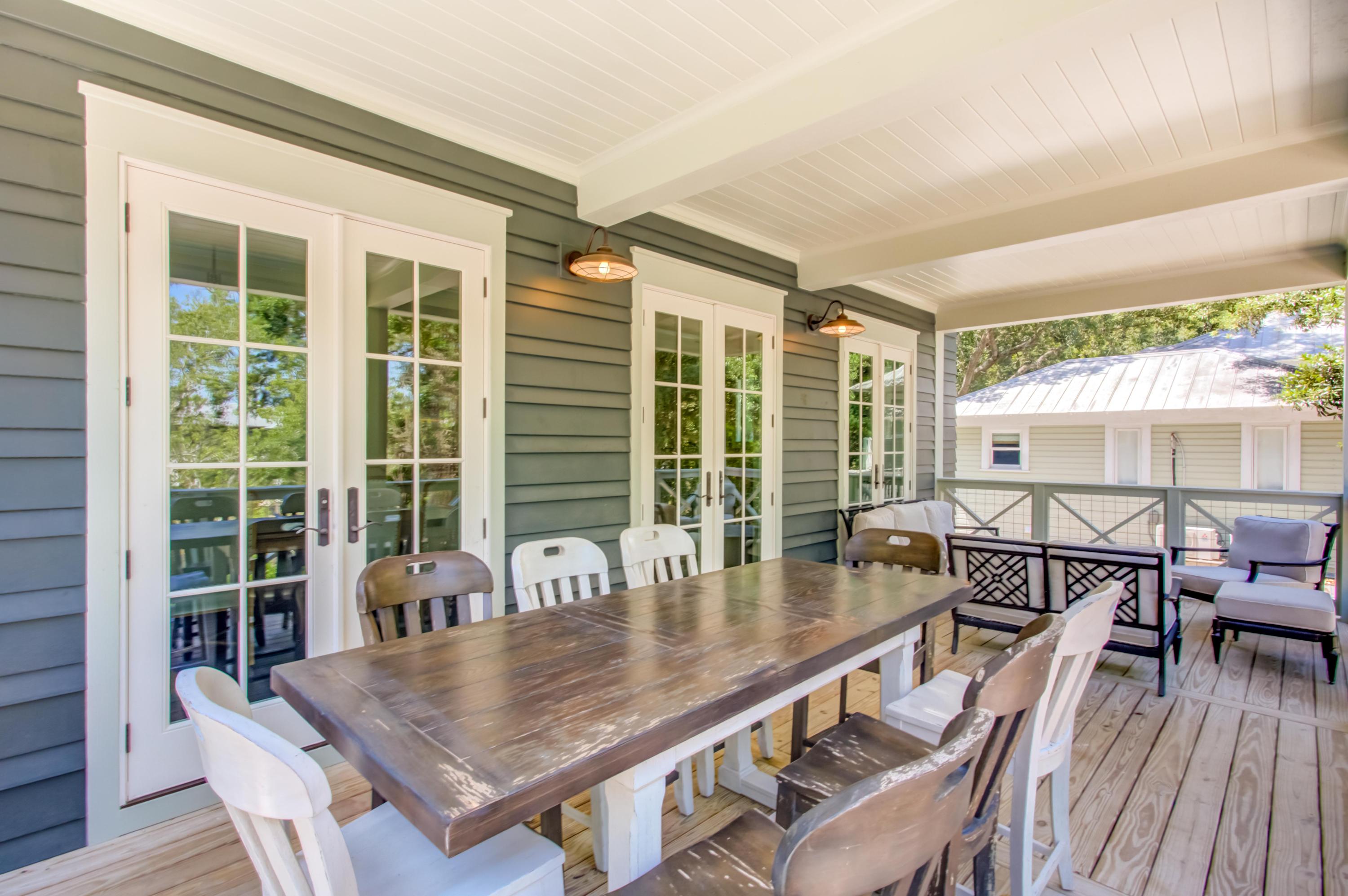177 Grayton Trail Road Santa Rosa Beach, FL 32459 - Photo 43 of 78 a dining room with furniture window and wooden floor