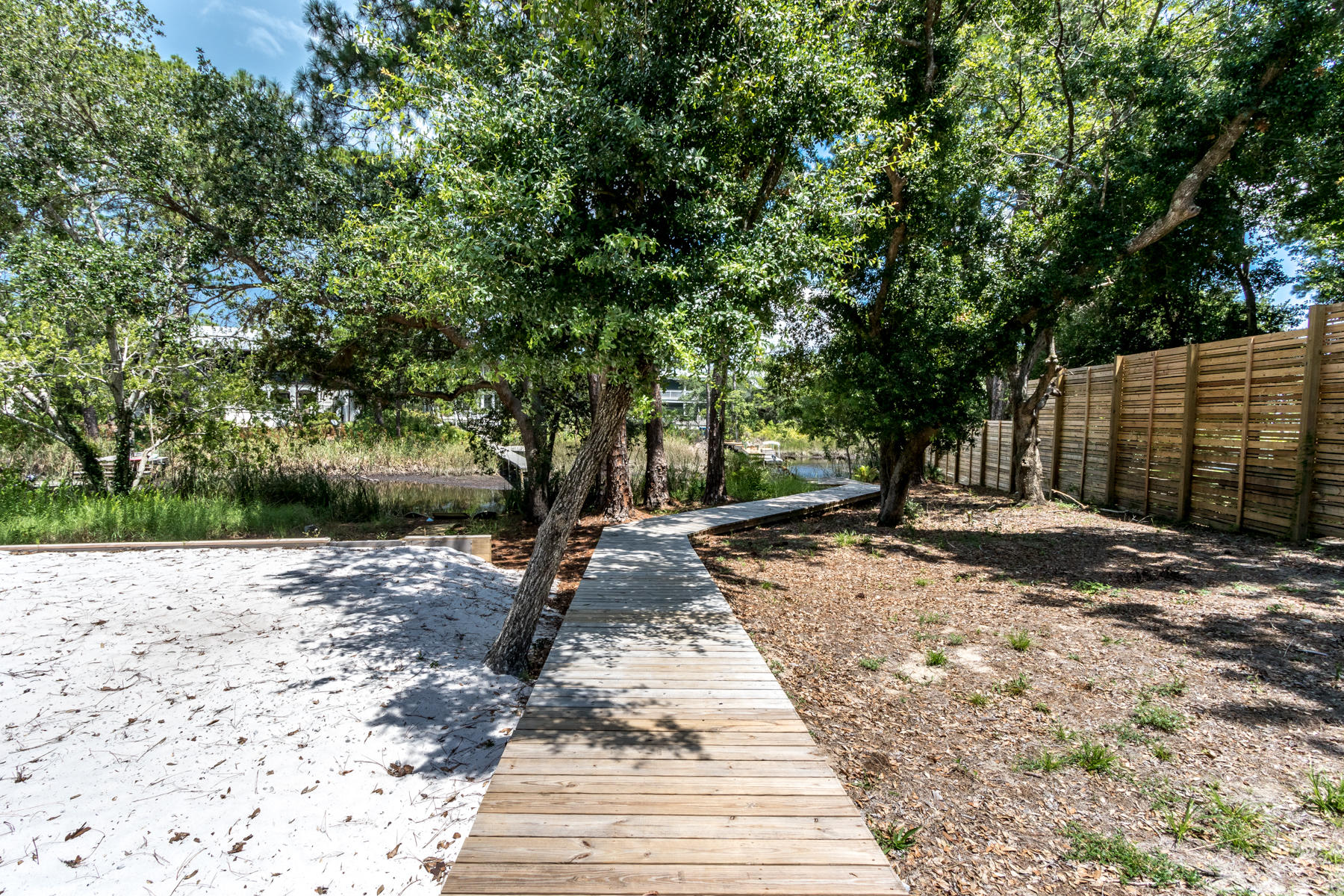 177 Grayton Trail Road Santa Rosa Beach, FL 32459 - Photo 61 of 78 a view of a backyard with large trees