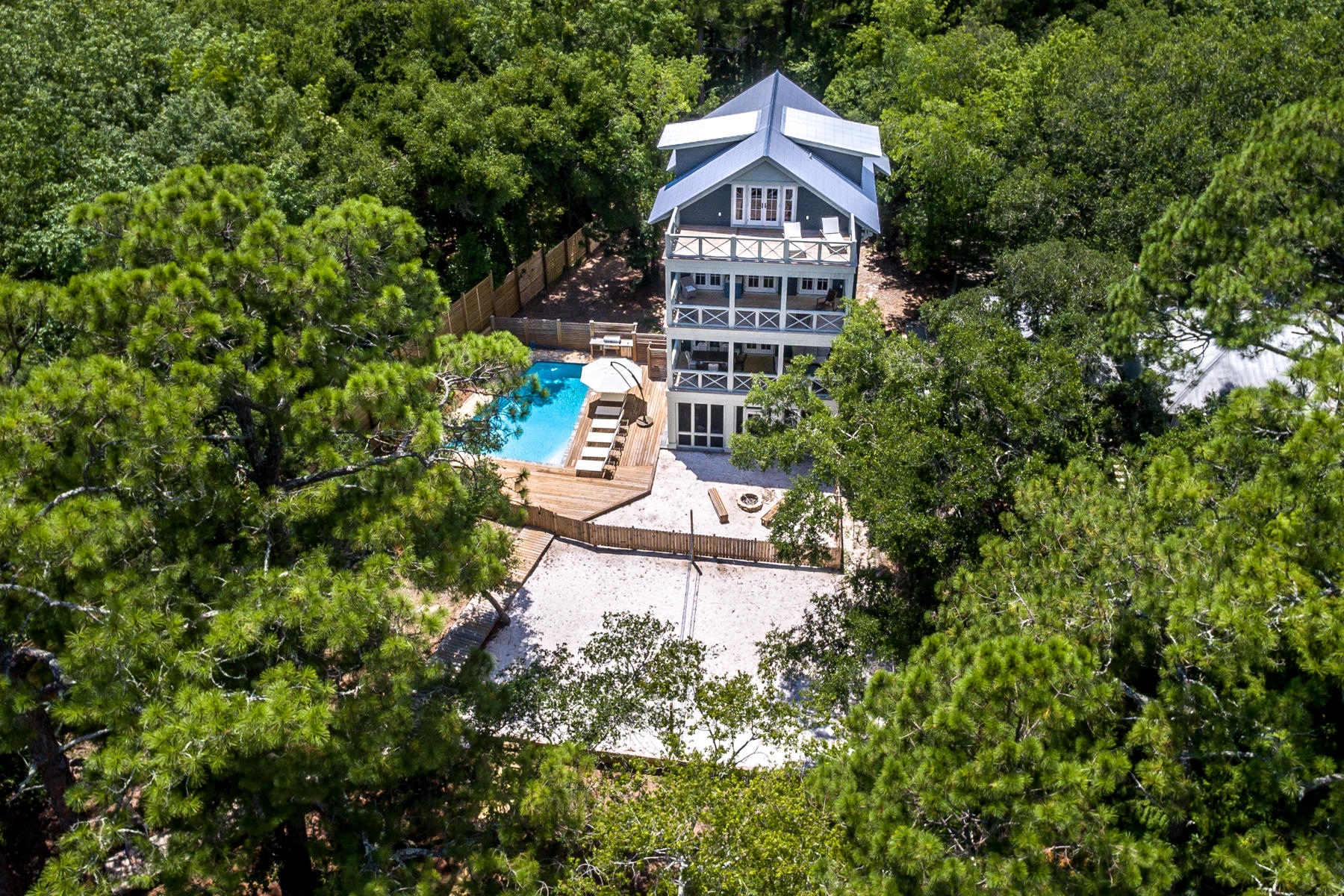 177 Grayton Trail Road Santa Rosa Beach, FL 32459 - Photo 70 of 78 a view of a house with a yard and garden