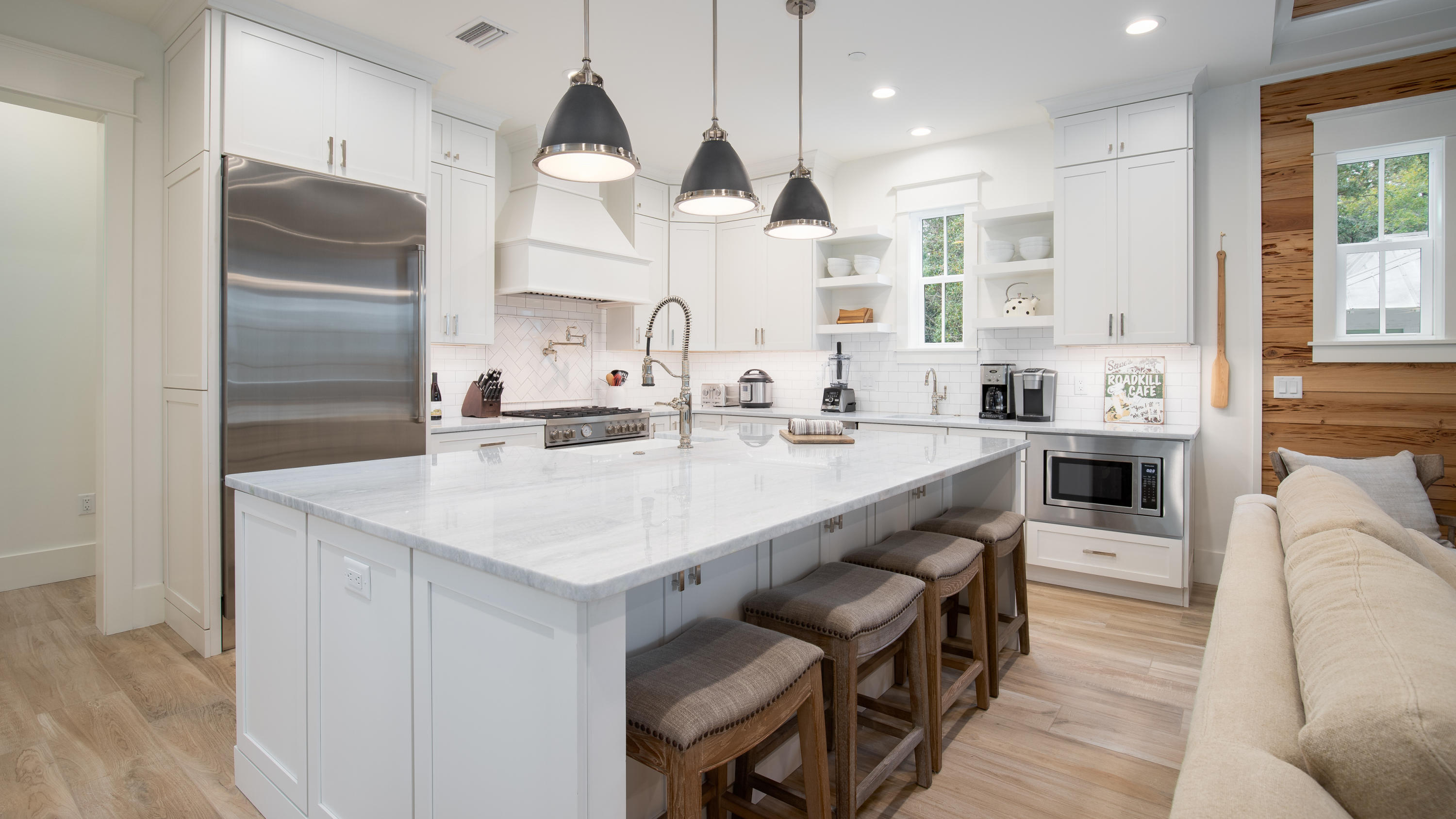 177 Grayton Trail Road Santa Rosa Beach, FL 32459 - Photo 10 of 78 a kitchen with stainless steel appliances kitchen island granite countertop a sink and cabinets