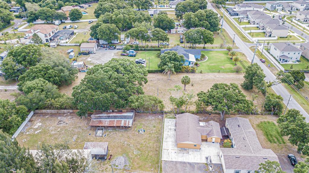 8027 Gardner Road Tampa, FL 33625 - Photo 19 of 22 an aerial view of residential houses with outdoor space and swimming pool