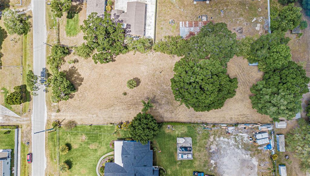 8027 Gardner Road Tampa, FL 33625 - Photo 2 of 22 an aerial view of a house with a yard