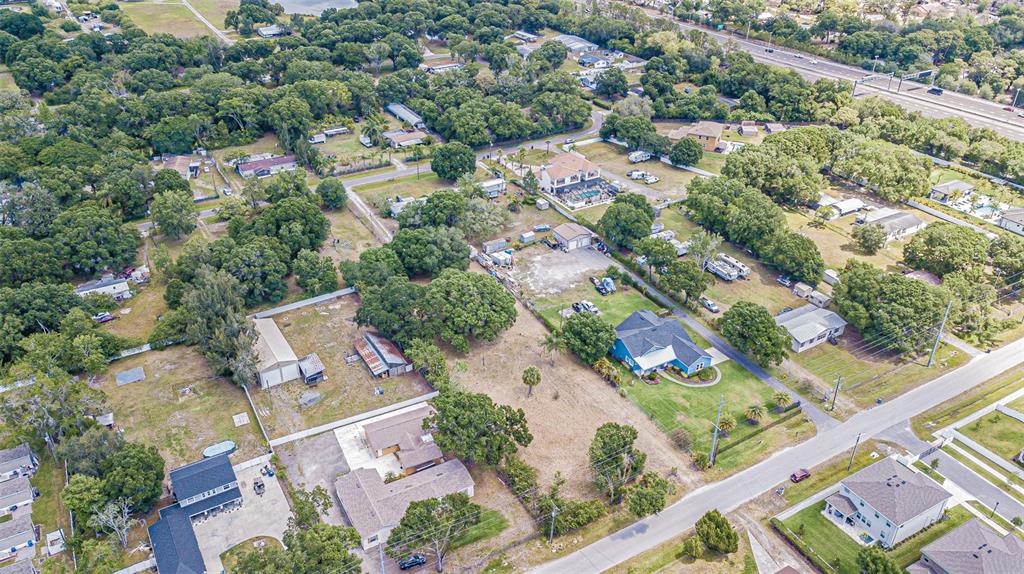 8027 Gardner Road Tampa, FL 33625 - Photo 3 of 22 an aerial view of a city with lots of residential buildings