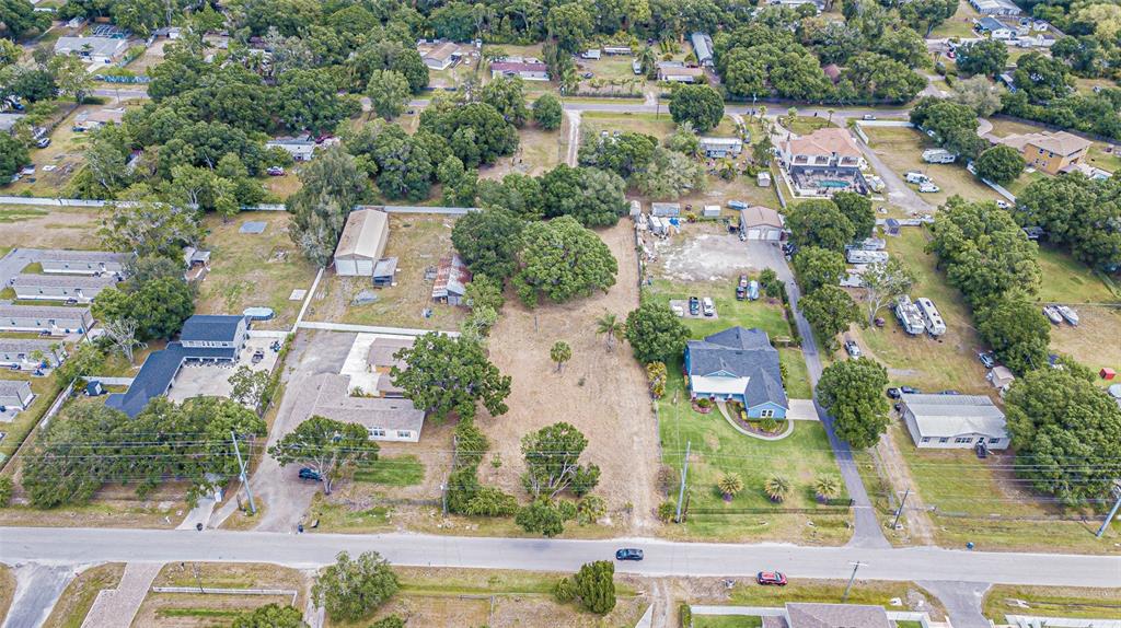 8027 Gardner Road Tampa, FL 33625 - Photo 5 of 22 an aerial view of residential houses with outdoor space