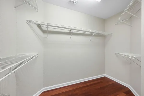 a view of a room with racks on the wall