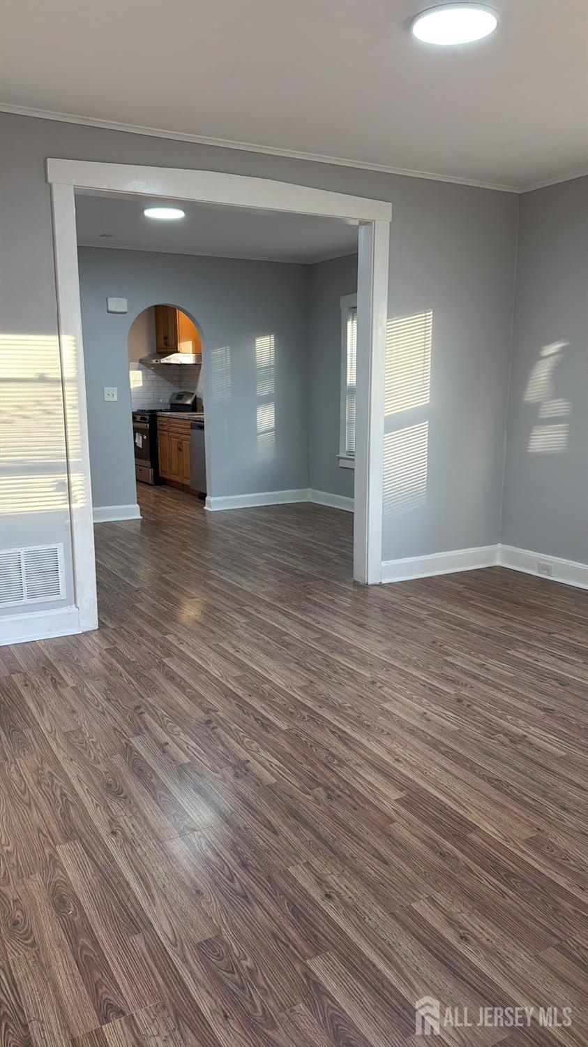 463 Valmere Avenue Piscataway, NJ 08854 - Photo 3 of 18 a view of empty room with wooden floor and fan
