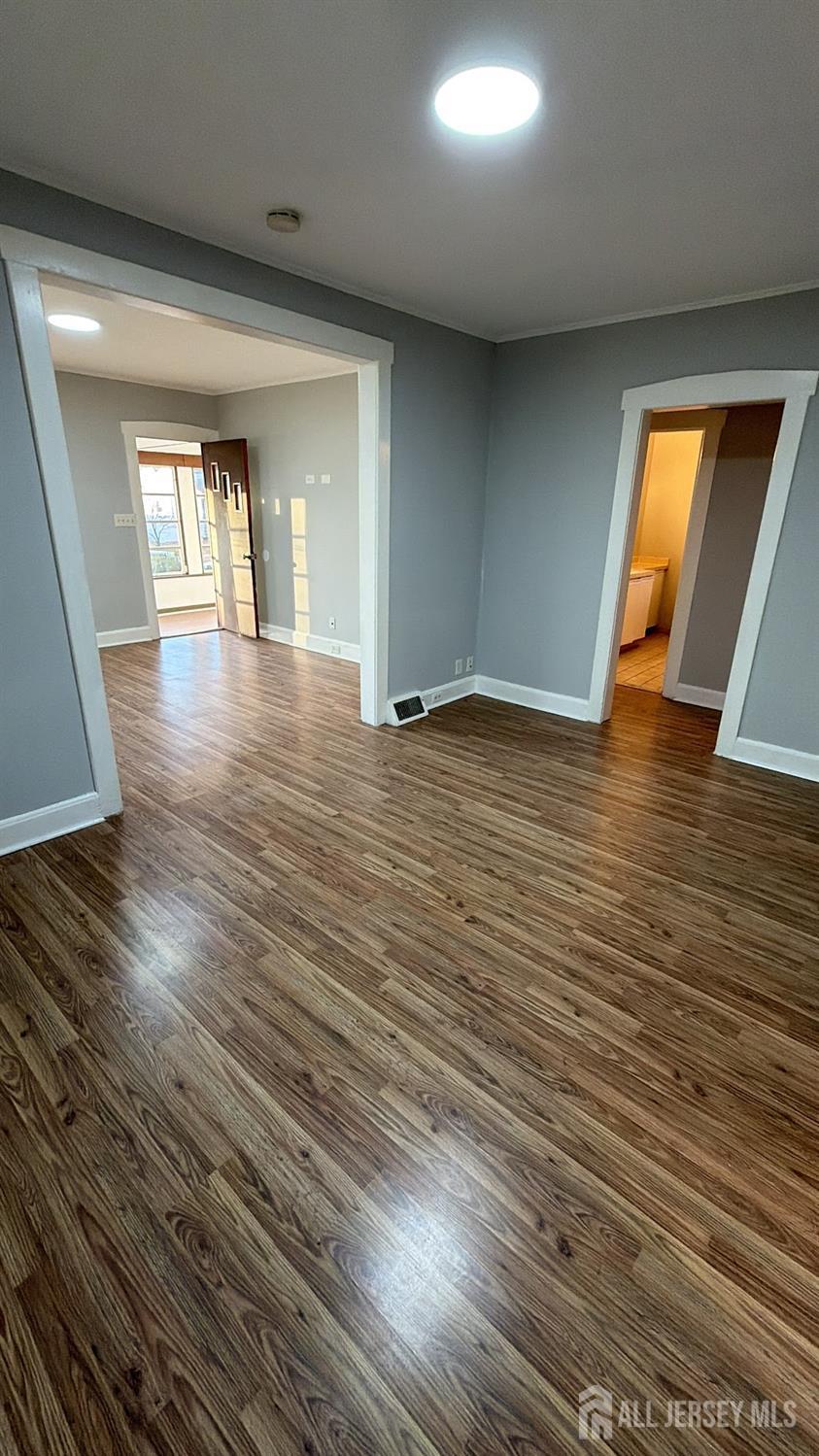 463 Valmere Avenue Piscataway, NJ 08854 - Photo 4 of 18 a view of empty room with wooden floor and fan