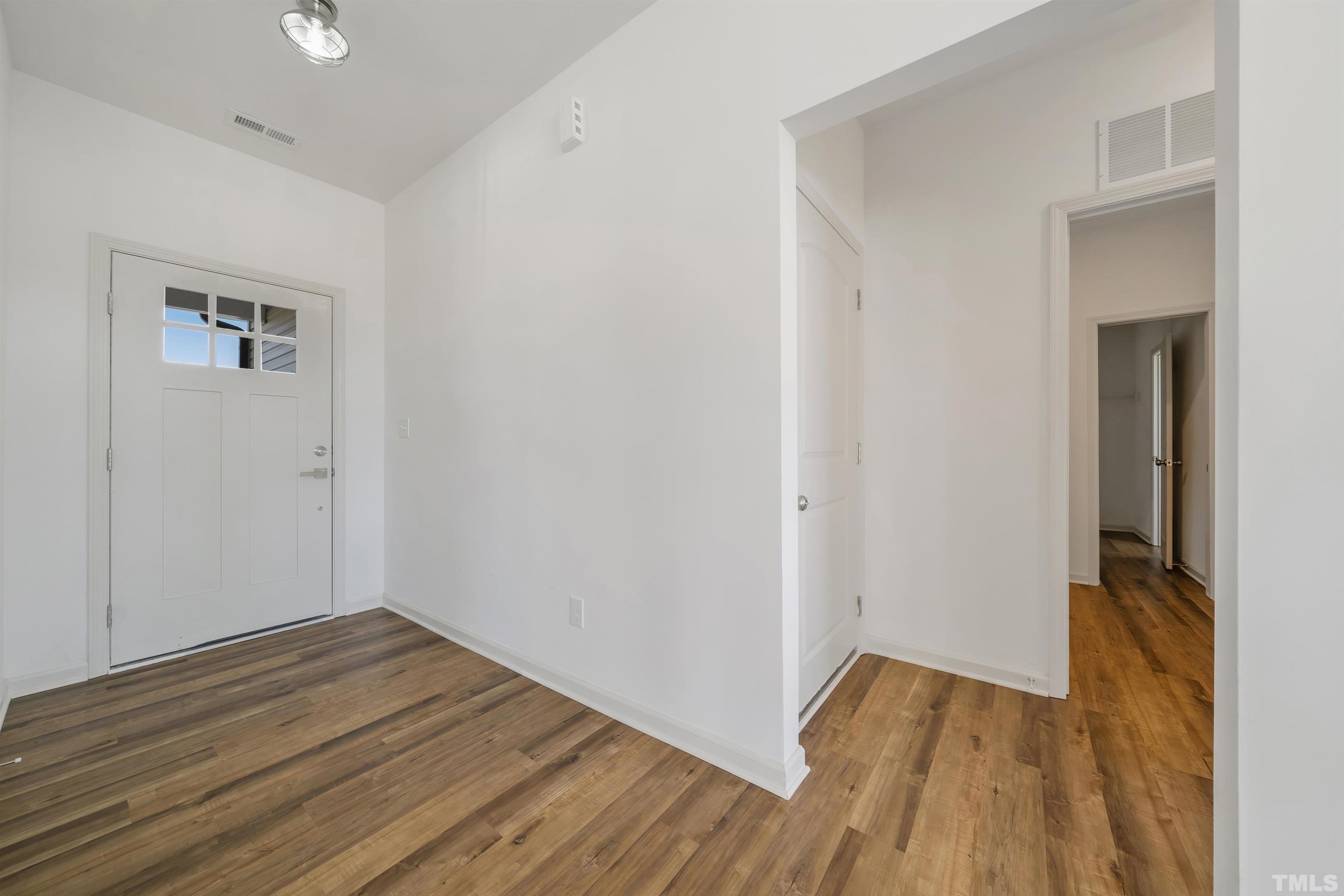 4107 Needham Road Bailey, NC 27807 - Photo 2 of 24 a view of a room with wooden floor