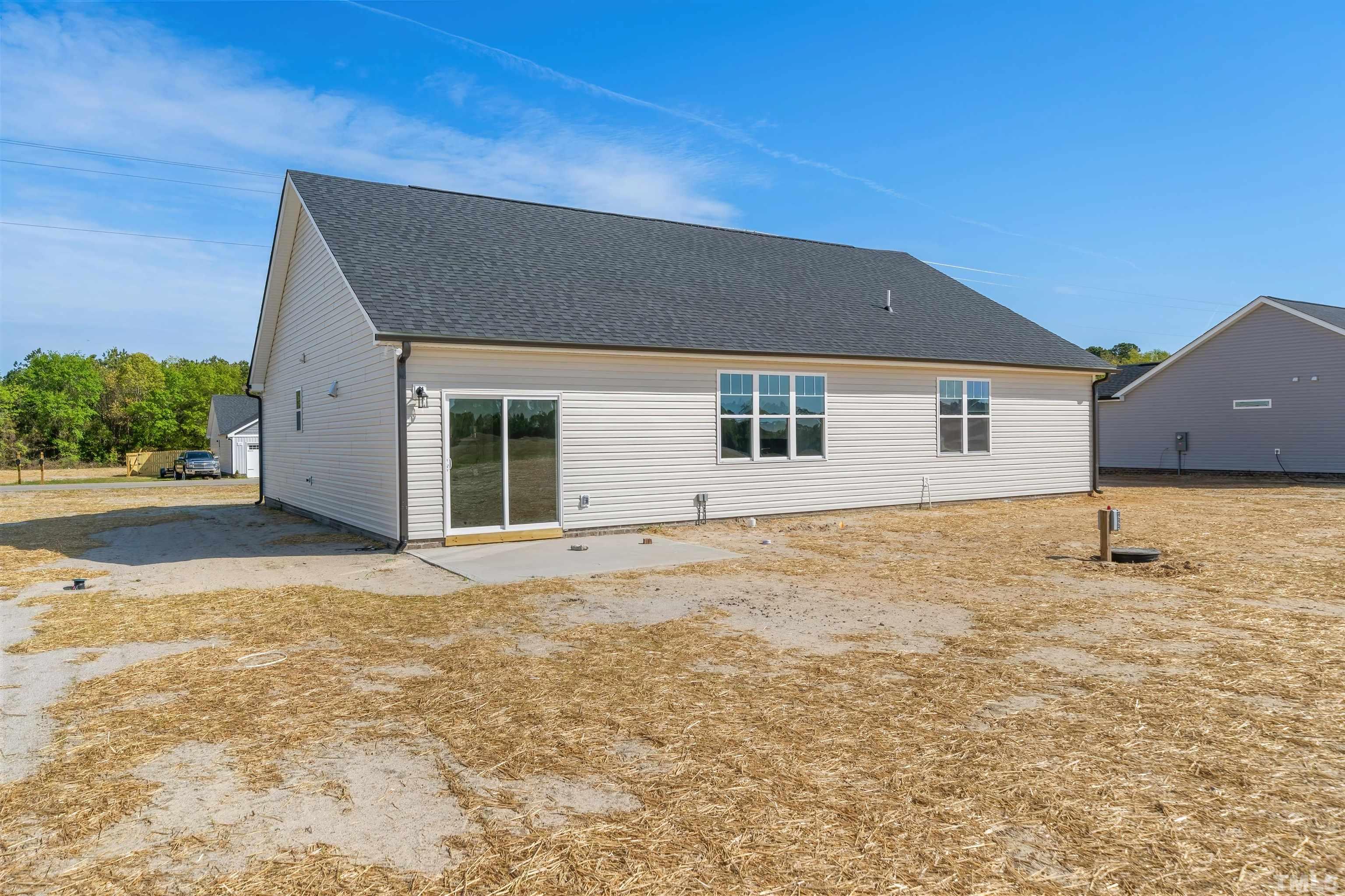 4107 Needham Road Bailey, NC 27807 - Photo 24 of 24 a house with yard in front of it