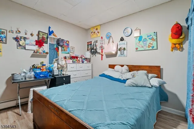 a bedroom with a bed and furniture