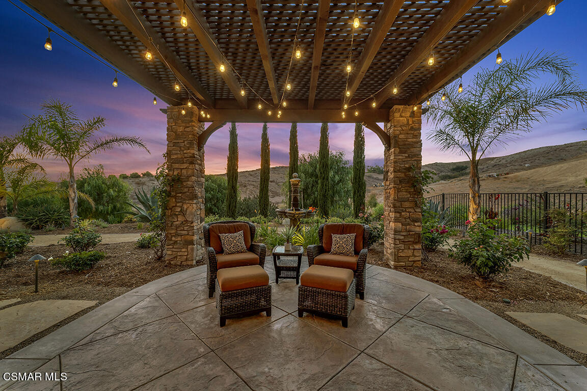 8577 Happy Camp Road Moorpark, CA 93021 - Photo 3 of 96 a view of a patio with chairs and potted plants