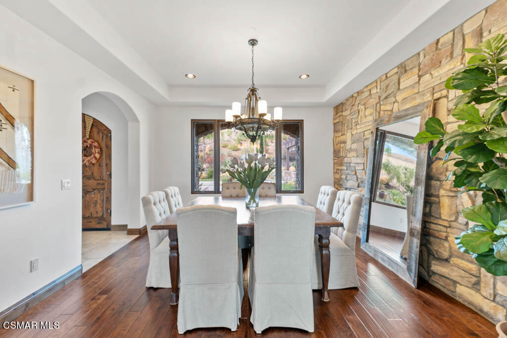 8577 Happy Camp Road Moorpark, CA 93021 - Photo 22 of 96 a view of a dining room with furniture window and wooden floor