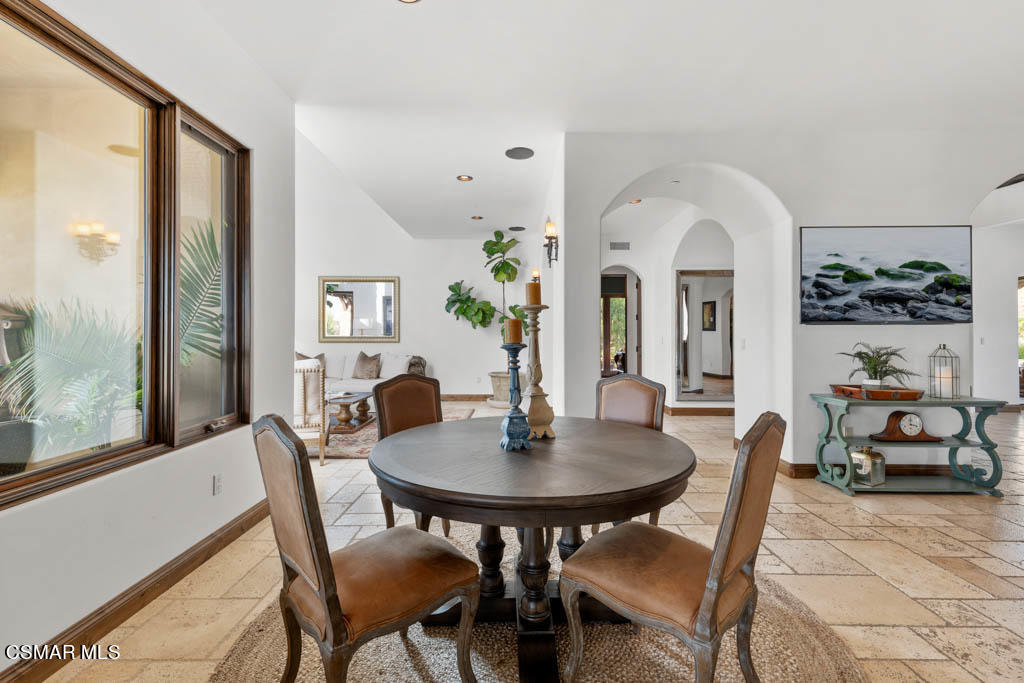8577 Happy Camp Road Moorpark, CA 93021 - Photo 53 of 96 a view of a dining room with furniture and a potted plant