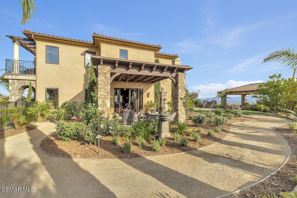 8577 Happy Camp Road Moorpark, CA 93021 - Photo 74 of 96 a front view of a house with a garden
