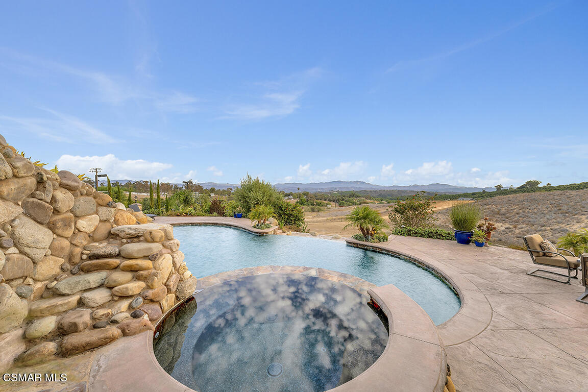 8577 Happy Camp Road Moorpark, CA 93021 - Photo 88 of 96 a view of a swimming pool and an ocean view