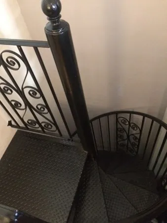 a bedroom with a bed and a closet