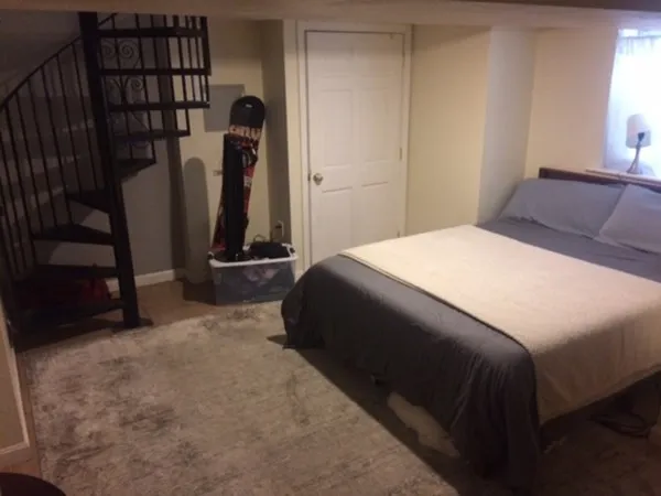 a bathroom with a sink a toilet and a shower