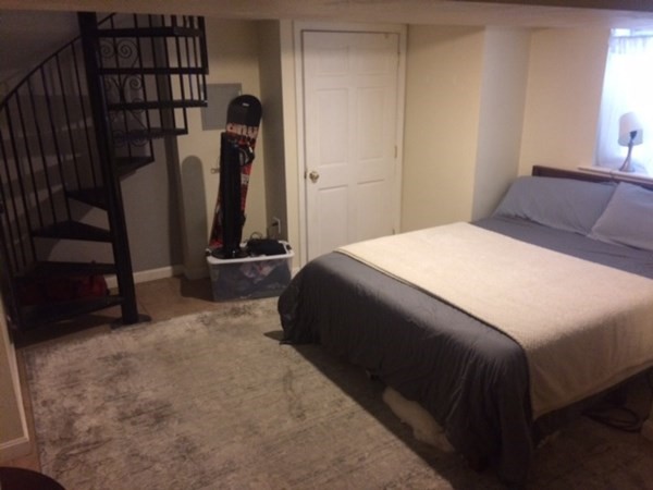 281 West 3rd Street, Unit 1 Boston, MA 02127 - Photo 8 of 11 a bedroom with a bed and a closet