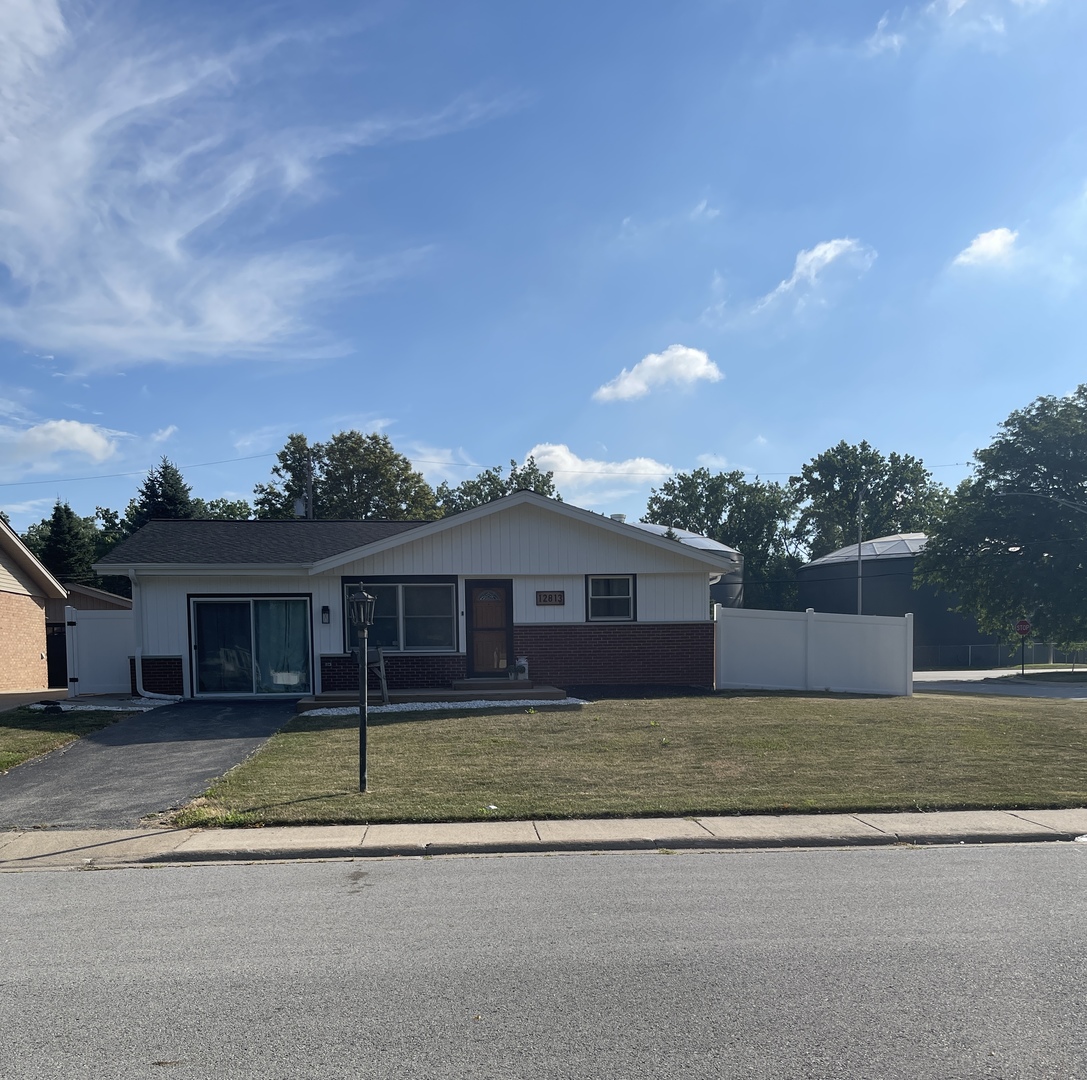 12813 East Playfield Dr  