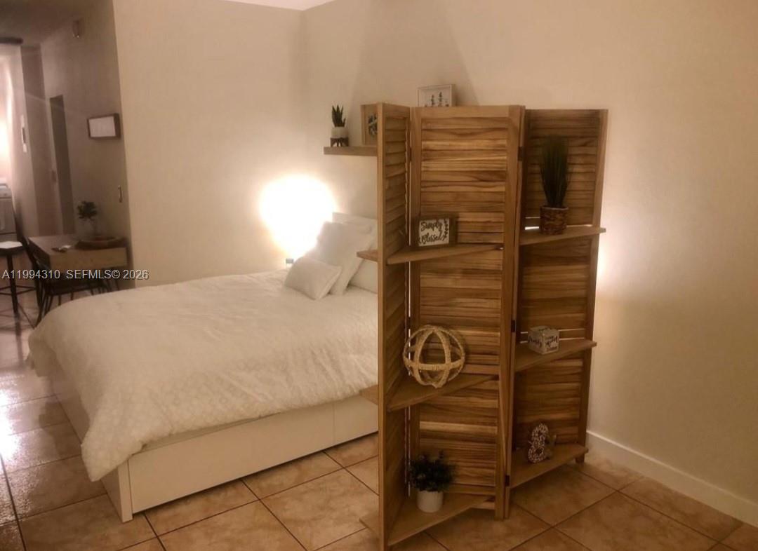 620 76th Street, Unit 11 Miami Beach, FL 33141 - Photo 13 of 14 a view of walk in closet