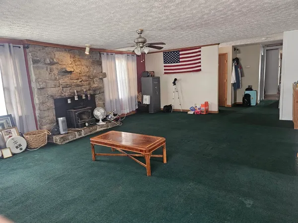 a room with furniture and wooden floor