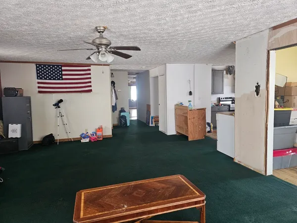 a kitchen with a sink cabinets and appliances