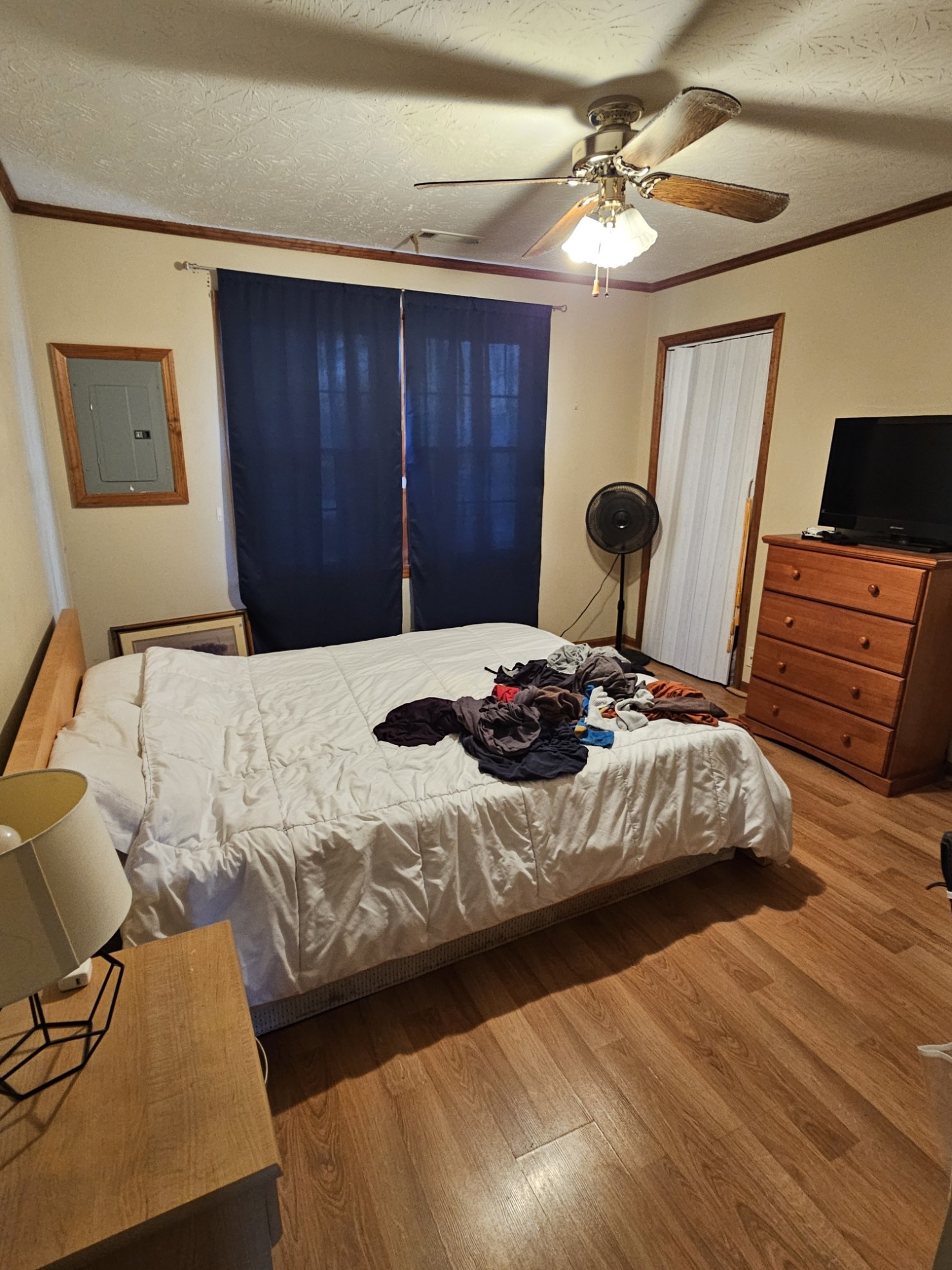 210 Twin Oaks Road McMinnville, TN 37110 - Photo 27 of 35 a bedroom with a bed and wooden floor
