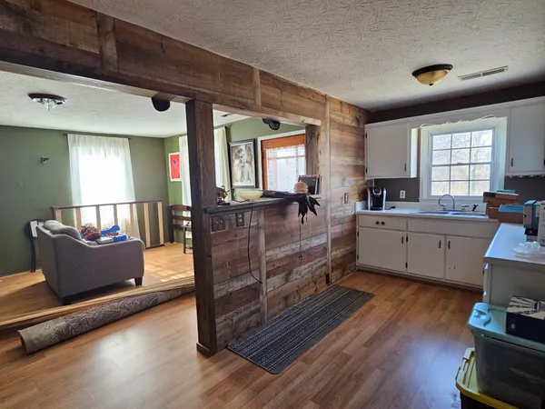 a living room with furniture and window