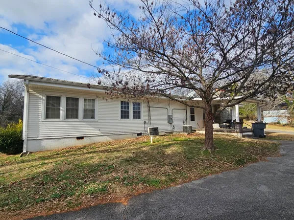 a room with furniture and wooden floor