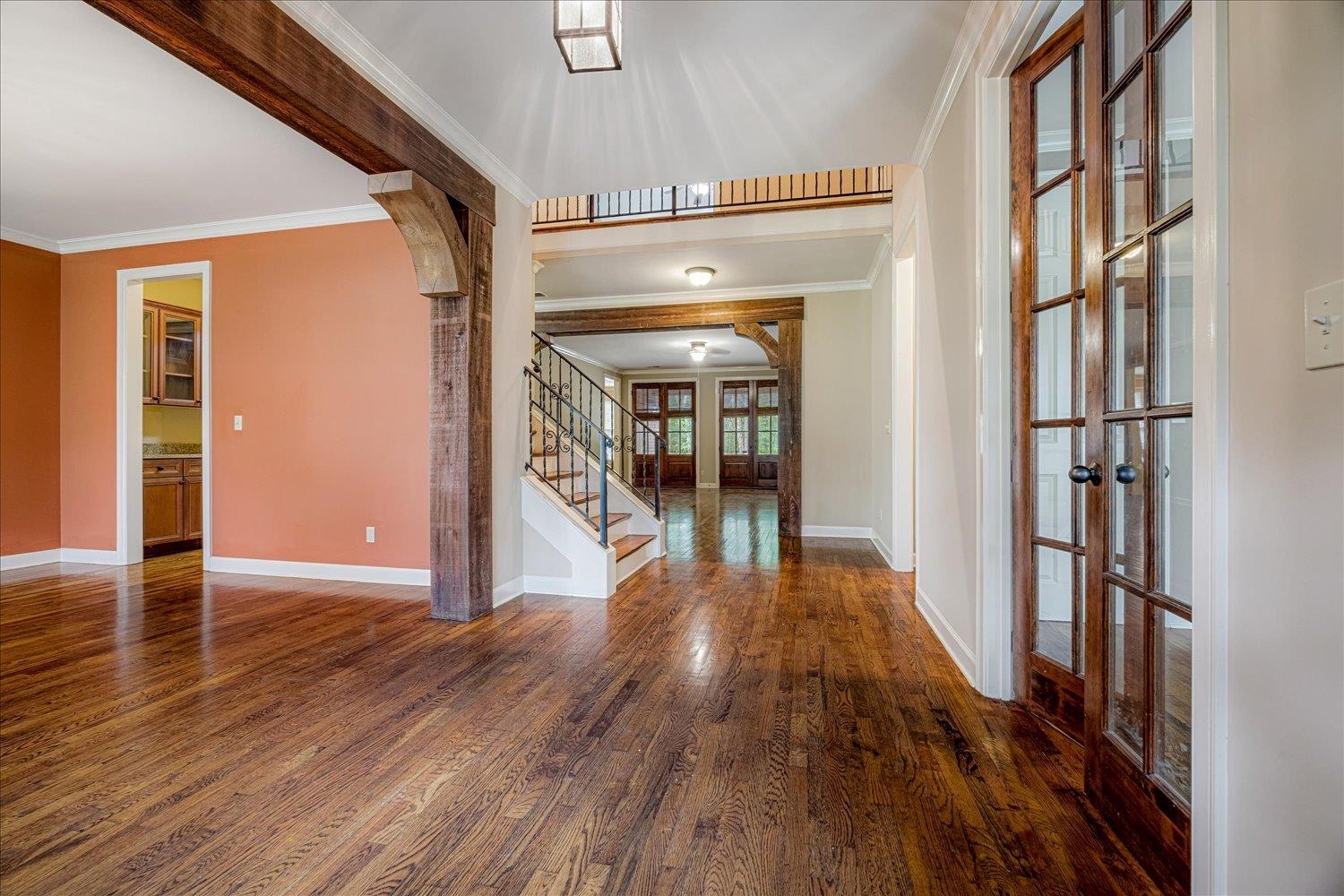 4597 Whisper Spring Drive Collierville, TN 38017 - Photo 8 of 40 Entryway featuring french doors, ornamental molding, dark wood finished floors, and stairs