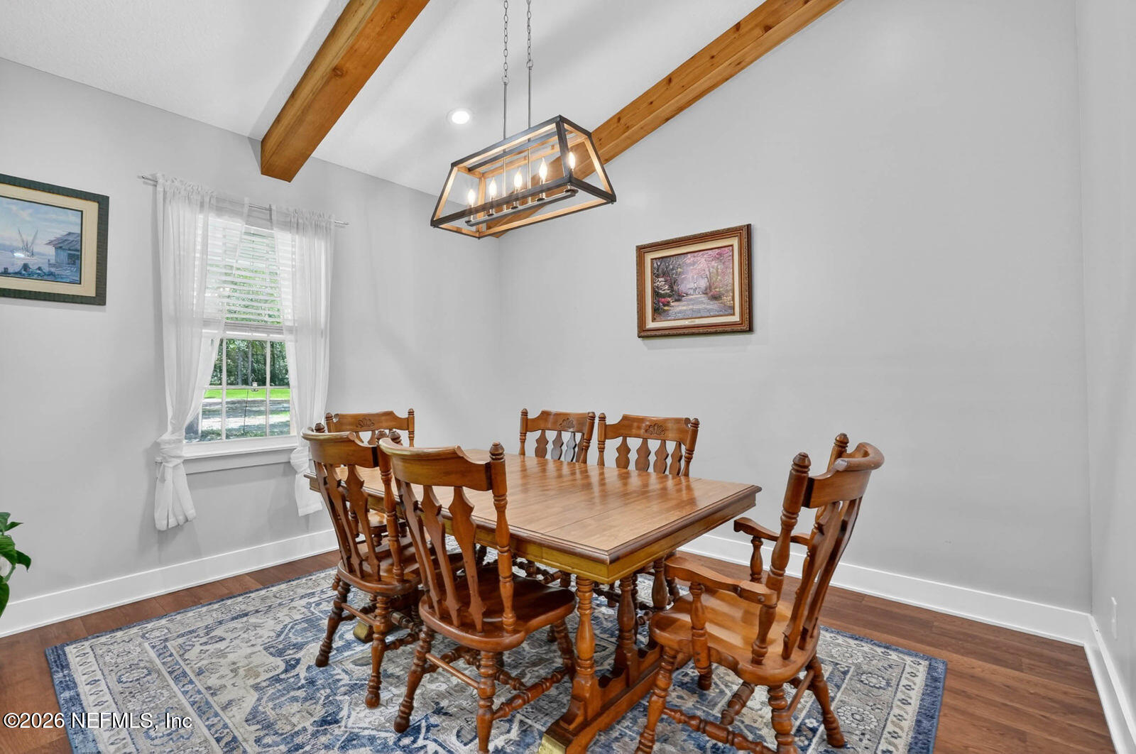 264 Peniel Church Road Palatka, FL 32177 - Photo 17 of 48 a view of a dining room with furniture and wooden floor