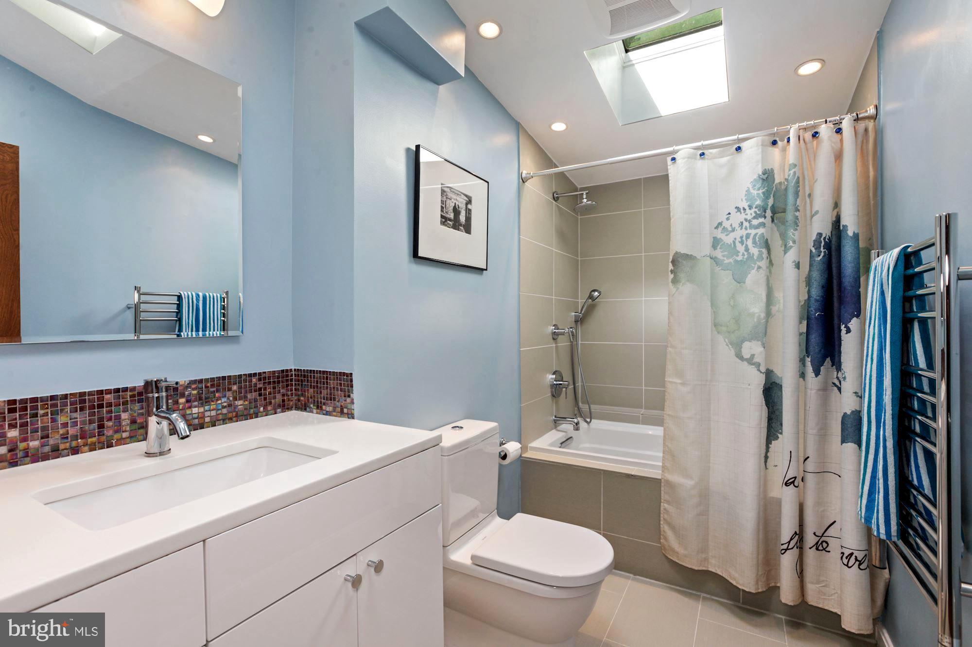 11008 Fawsett Road Potomac, MD 20854 - Photo 20 of 31 Updated Hall Bath with skylights, and heated floor