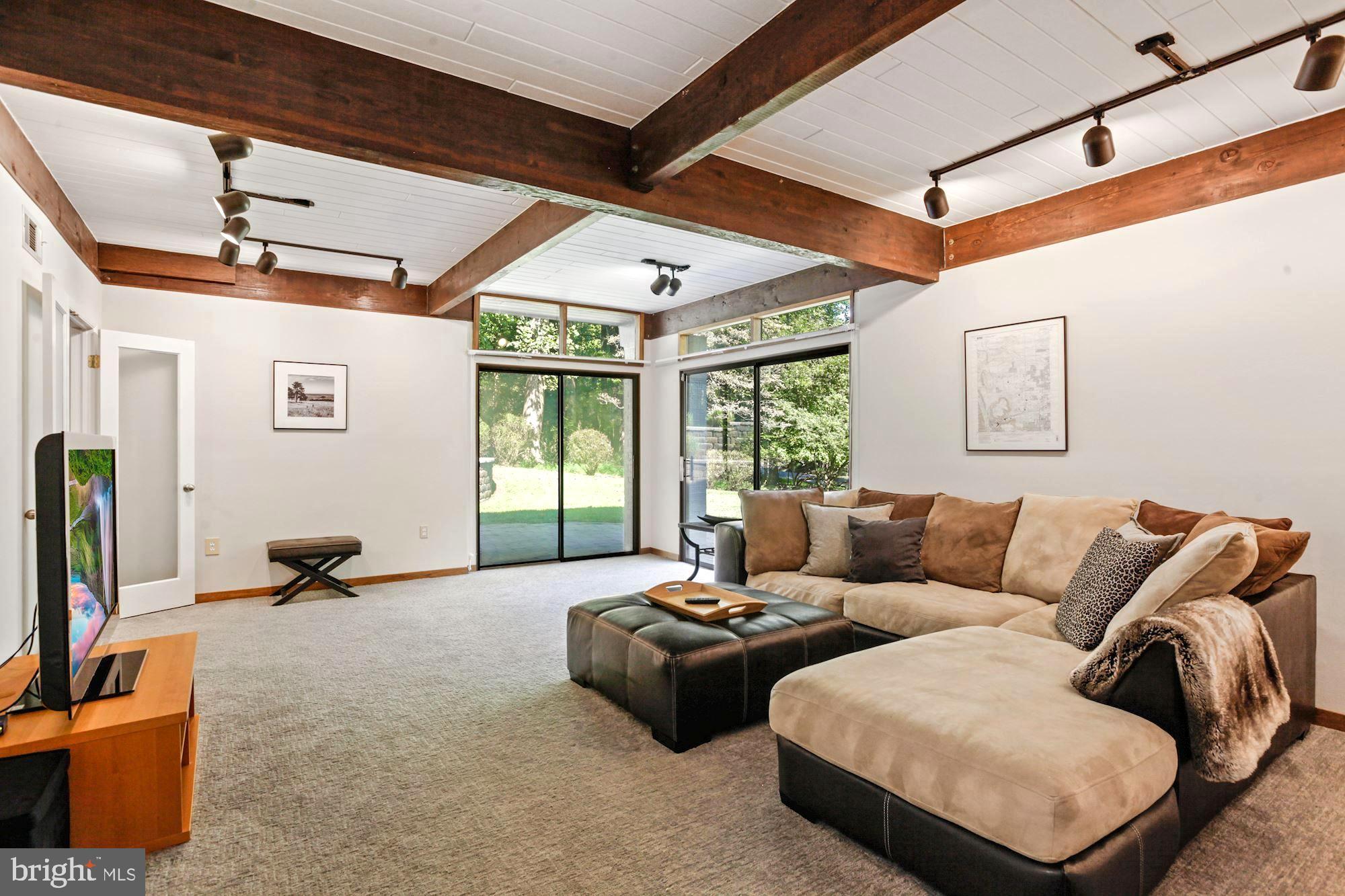 11008 Fawsett Road Potomac, MD 20854 - Photo 21 of 31 Large Recreation Room with two sliding glass doors