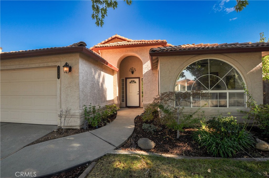 2194 Talbert Drive Chico, CA 95928 - Photo 1 of 1 a front view of a house with a yard
