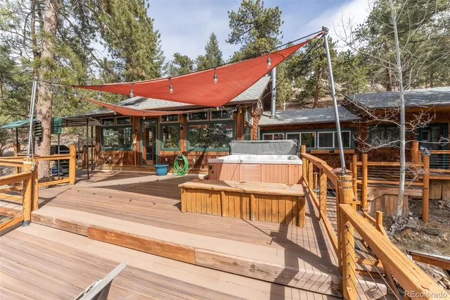a view of a balcony with chairs