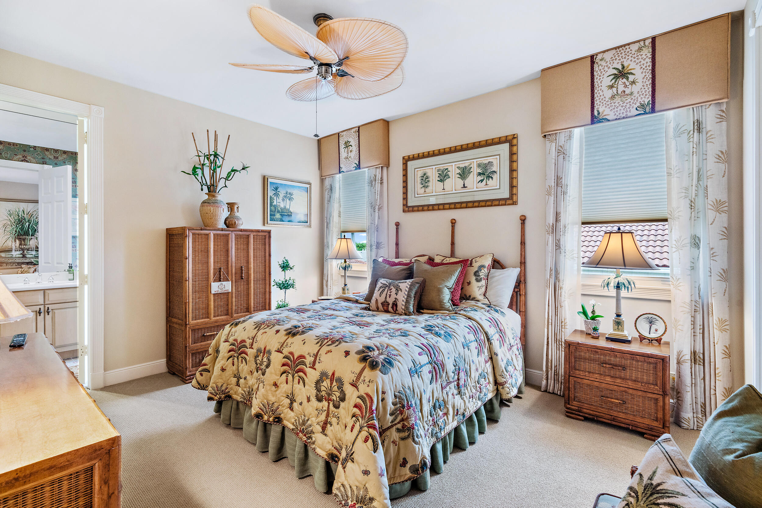 3152 Casseekey Island Road Jupiter, FL 33477 - Photo 29 of 45 a bedroom with bed and wooden floor