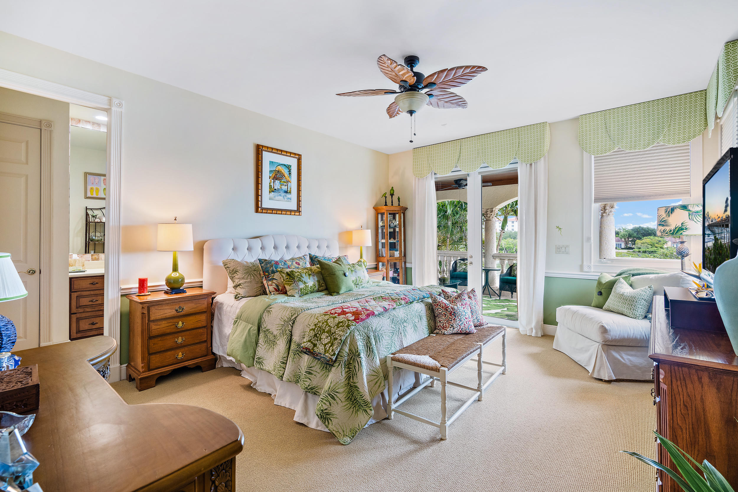 3152 Casseekey Island Road Jupiter, FL 33477 - Photo 30 of 45 a living room with furniture and a large window