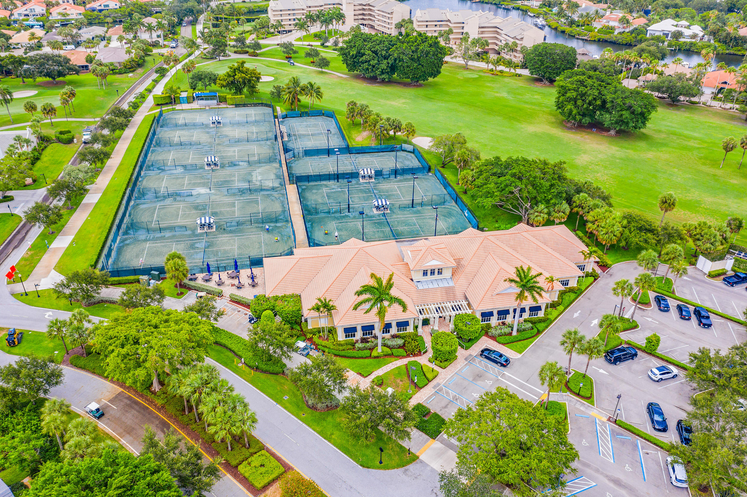 3152 Casseekey Island Road Jupiter, FL 33477 - Photo 43 of 45 a view of an outdoor space with a swimming pool