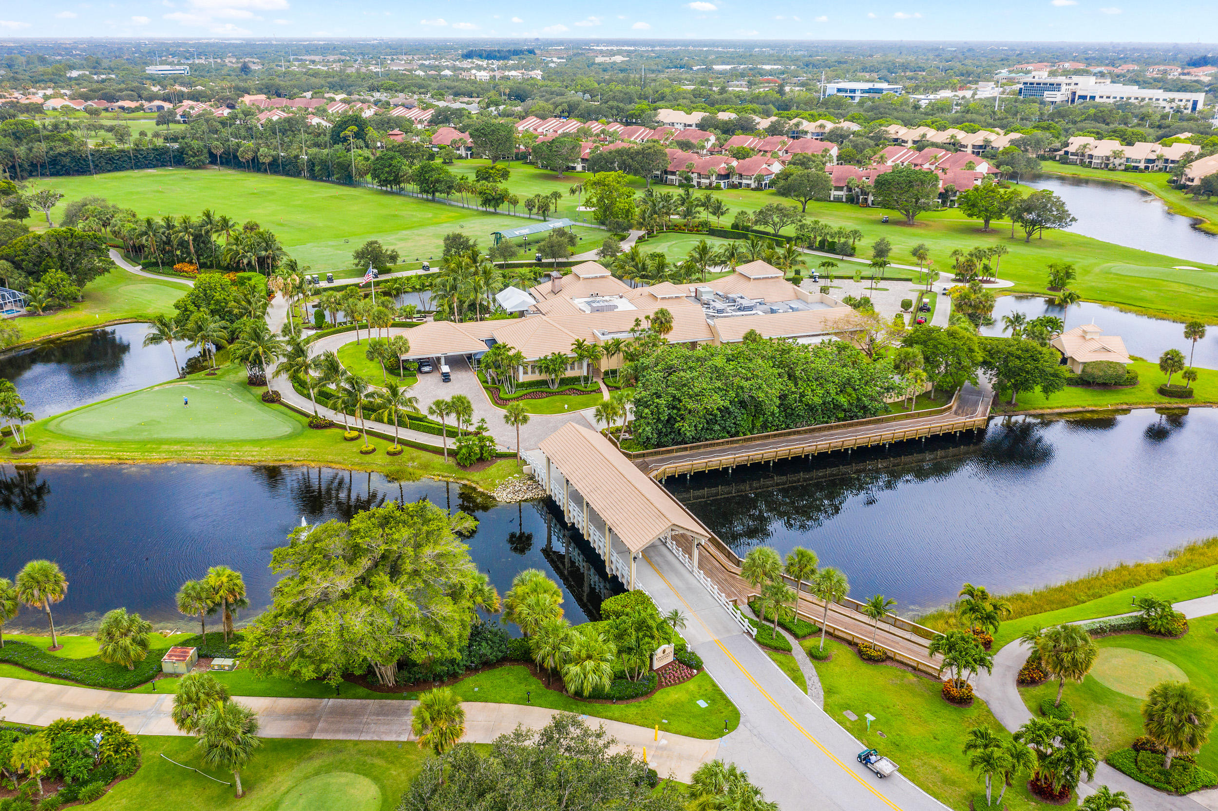 3152 Casseekey Island Road Jupiter, FL 33477 - Photo 44 of 45 an aerial view of a house with a garden and lake view