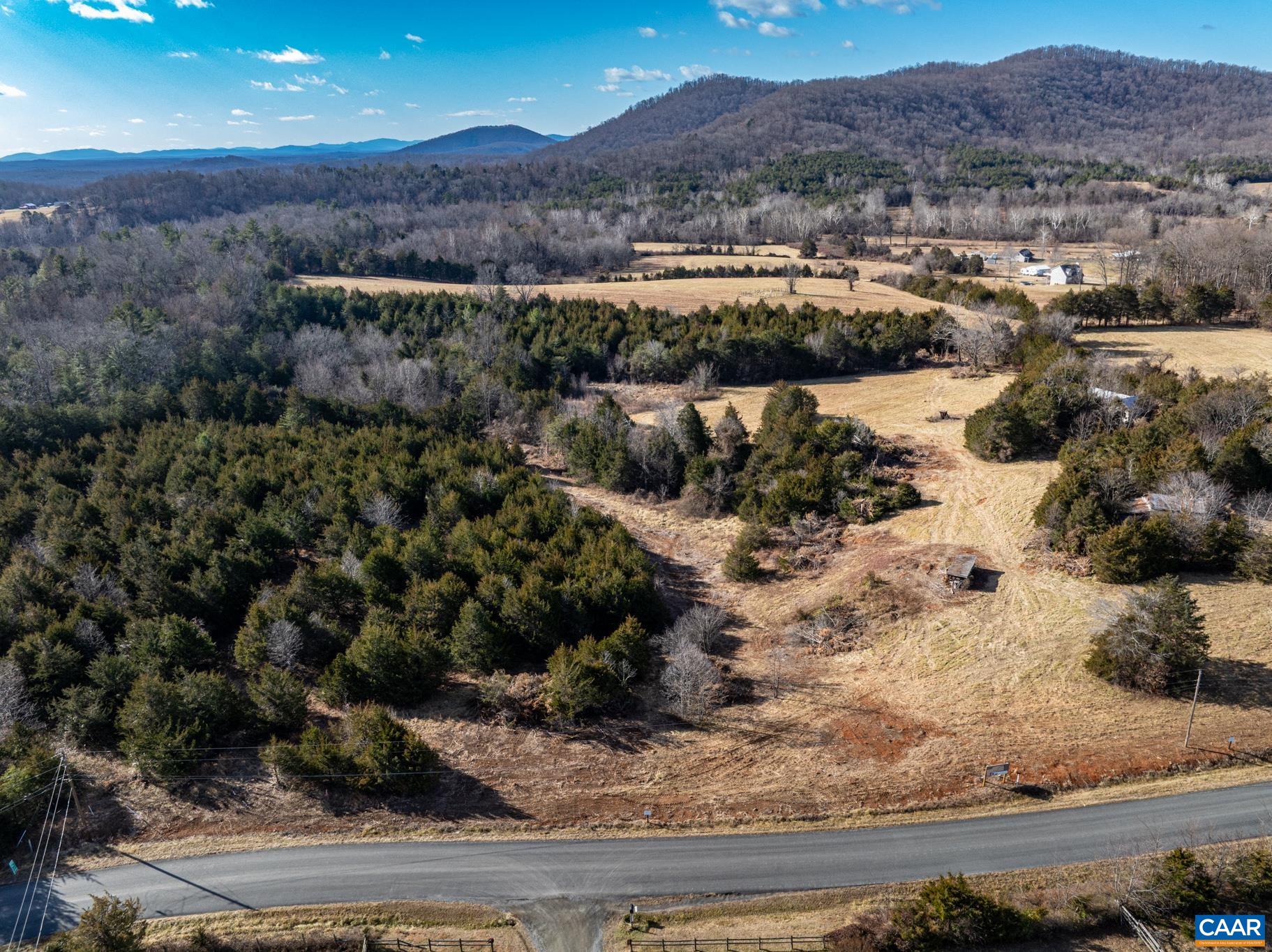 Lot 15 Pea Ridge Road Hood, VA 22723 - Photo 2 of 9 a view of a lake with mountains in the background