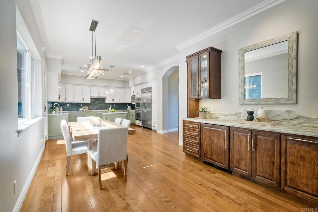 2559 Fire Mountain Drive Oceanside, CA 92054 - Photo 13 of 43 a view of a kitchen and dining room